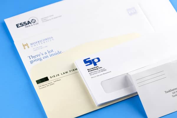 Custom printed envelopes for direct mail campaigns by Philly Printing