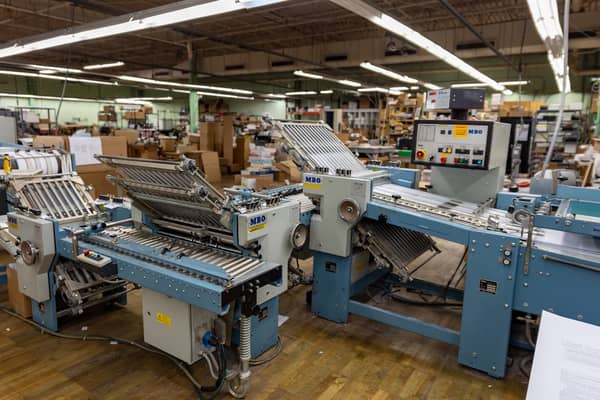 Advanced commercial printing equipment and production floor at Philly Printing Company